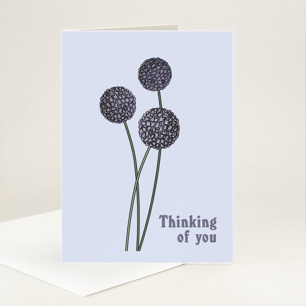 3 long-stemmed alliums elegantly intertwined with Thinking of You wording