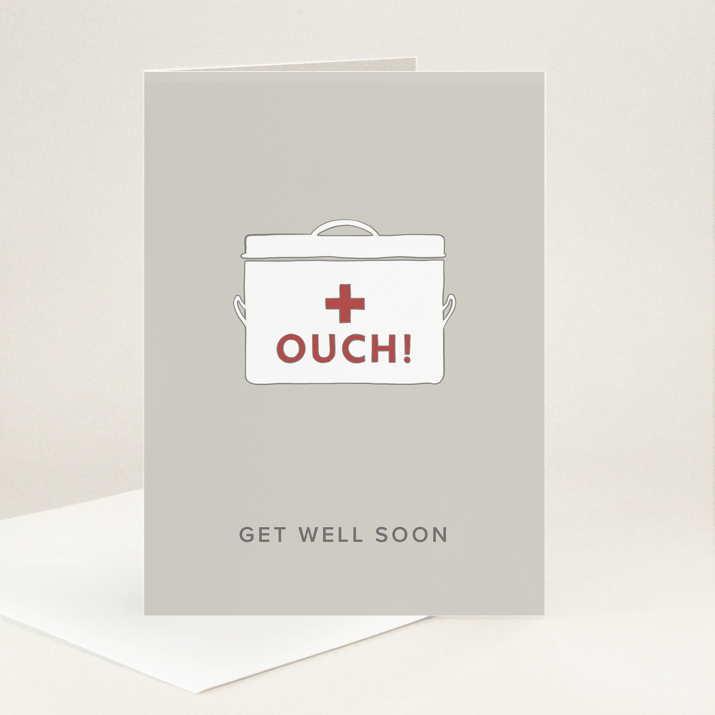 Get Well Soon medicine tine with 'OUCH!' in drawn red capital letters