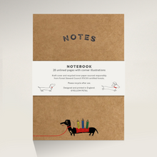 Load image into Gallery viewer, Brown Kraft notebook cover with illustration of Winston sausage dog carrying 3 pencils on his back with he words &#39;notes&#39;.
